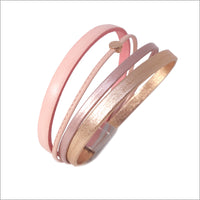 Pulsera multieslabones de cuero dorado y plateado