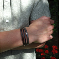Multi-link leather bracelet with elephant loop