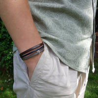 Multi-link leather bracelet with elephant loop