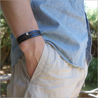Men's multi-link black and navy leather bracelet with metal loop