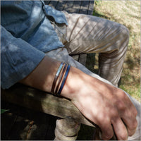Men's multi-link navy brown leather bracelet with metal loop