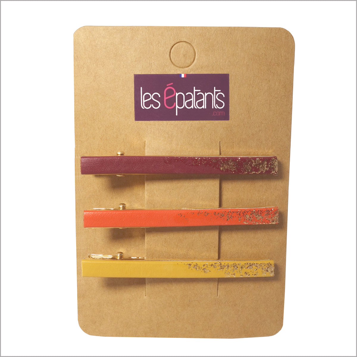 Trois pinces à cheveux en cuirs colorés et paillettes