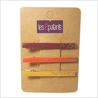 Trois pinces à cheveux en cuirs colorés et paillettes