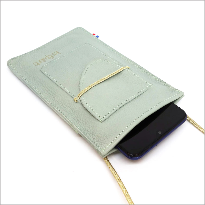 Phone pouch in almond green leather with adjustable shoulder strap