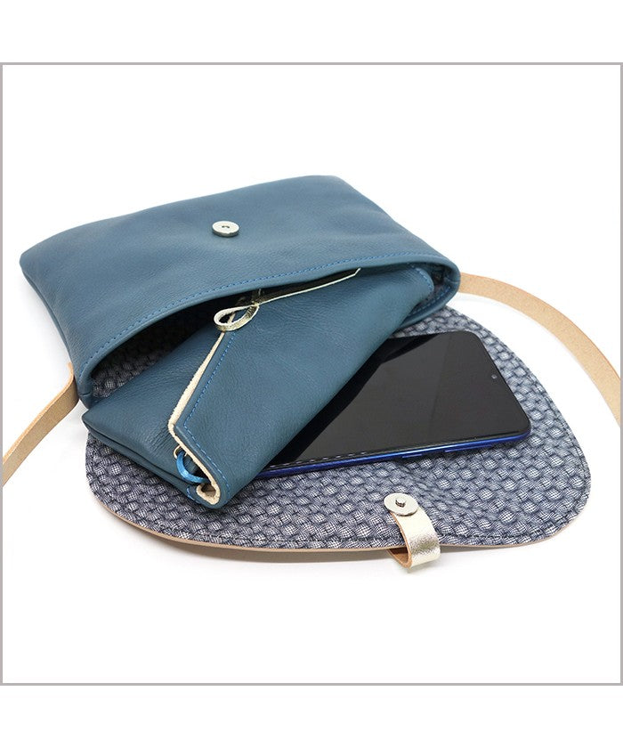 Small adjustable shoulder bag in slate blue and nude leather