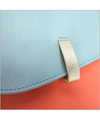 Pouch with adjustable shoulder strap in coral and sky blue leather