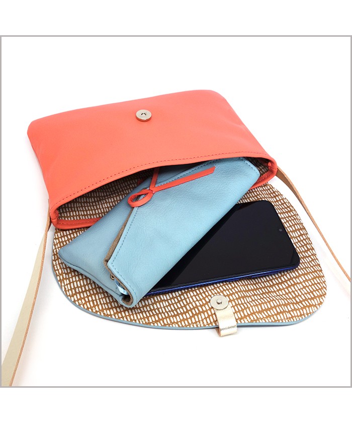 Pouch with adjustable shoulder strap in coral and sky blue leather