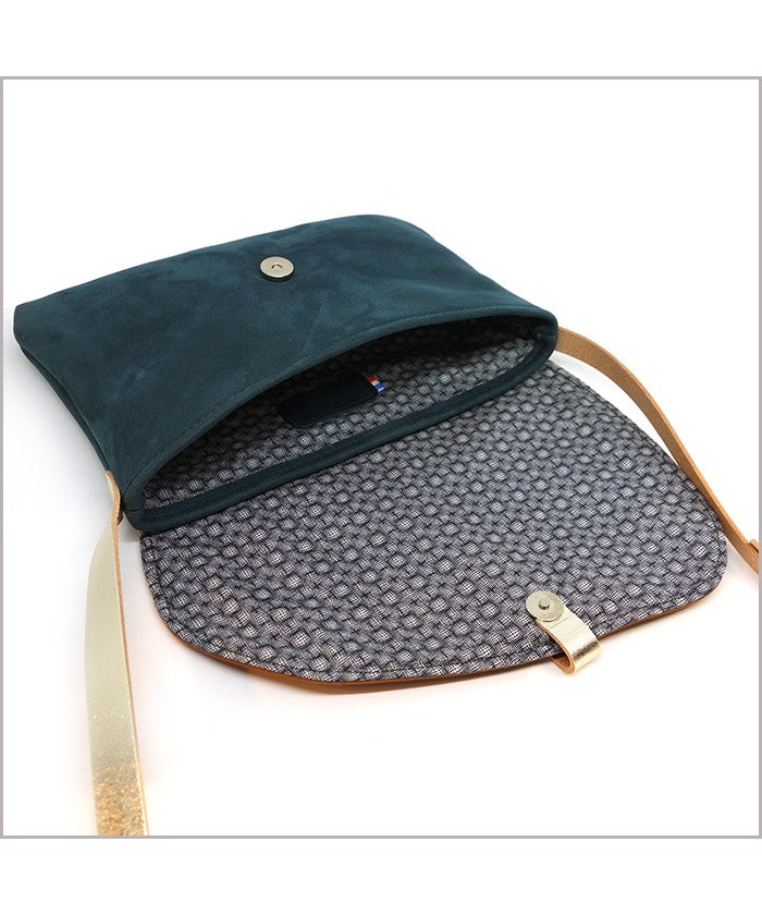 Clutch with adjustable shoulder strap in forest green and squirrel leather