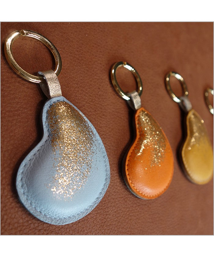 Sky blue and iridescent green leather key ring with sequins